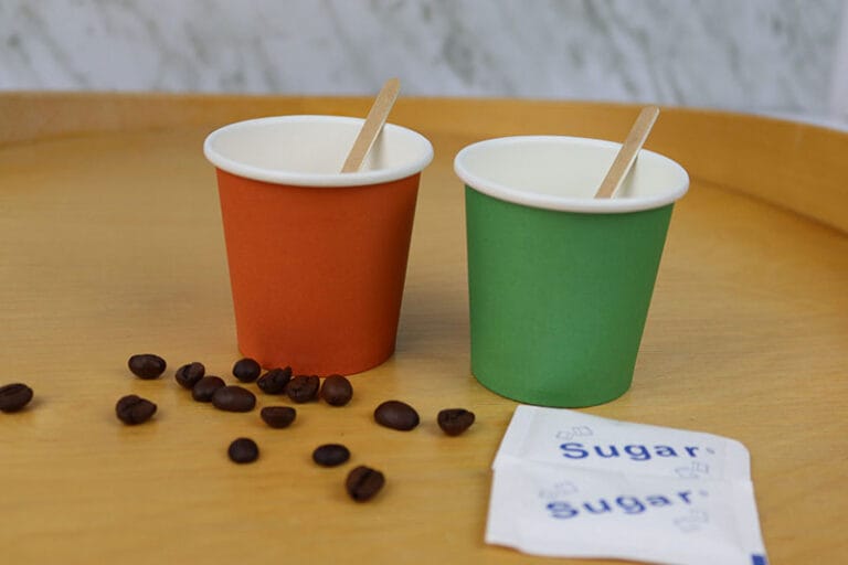 cups with green background